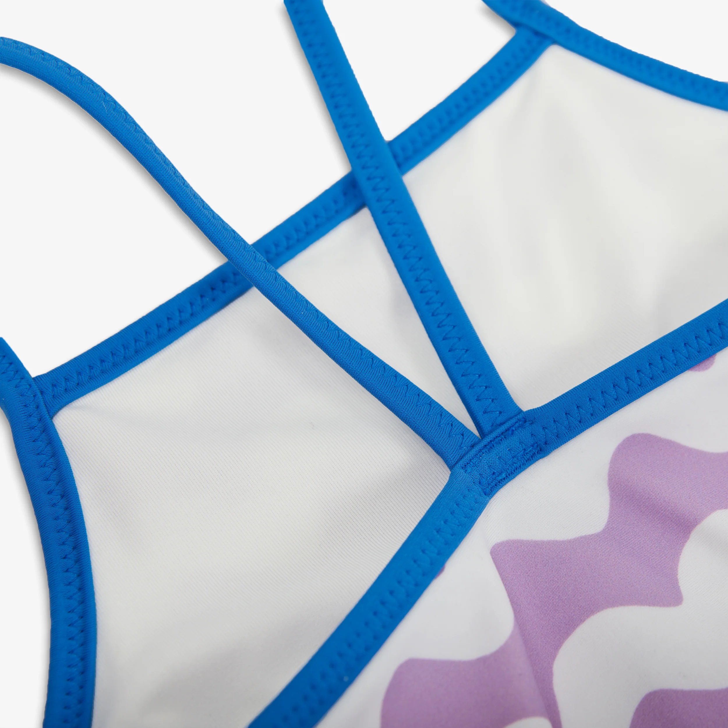 Kids swimsuit in waves