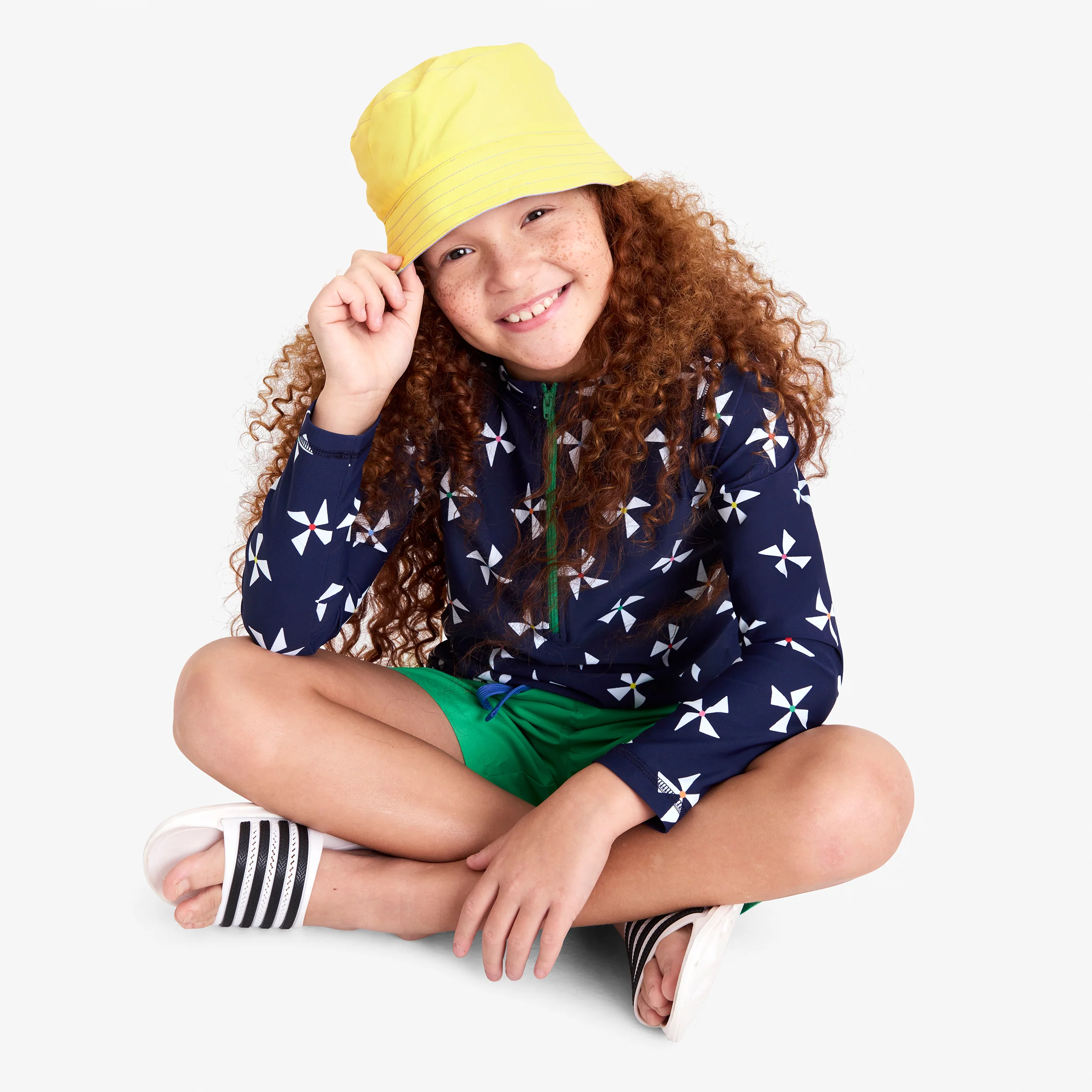 18646-kids-long-sleeve-half-zip-rash-guard-in-rainbow-pinwheels-1.webp