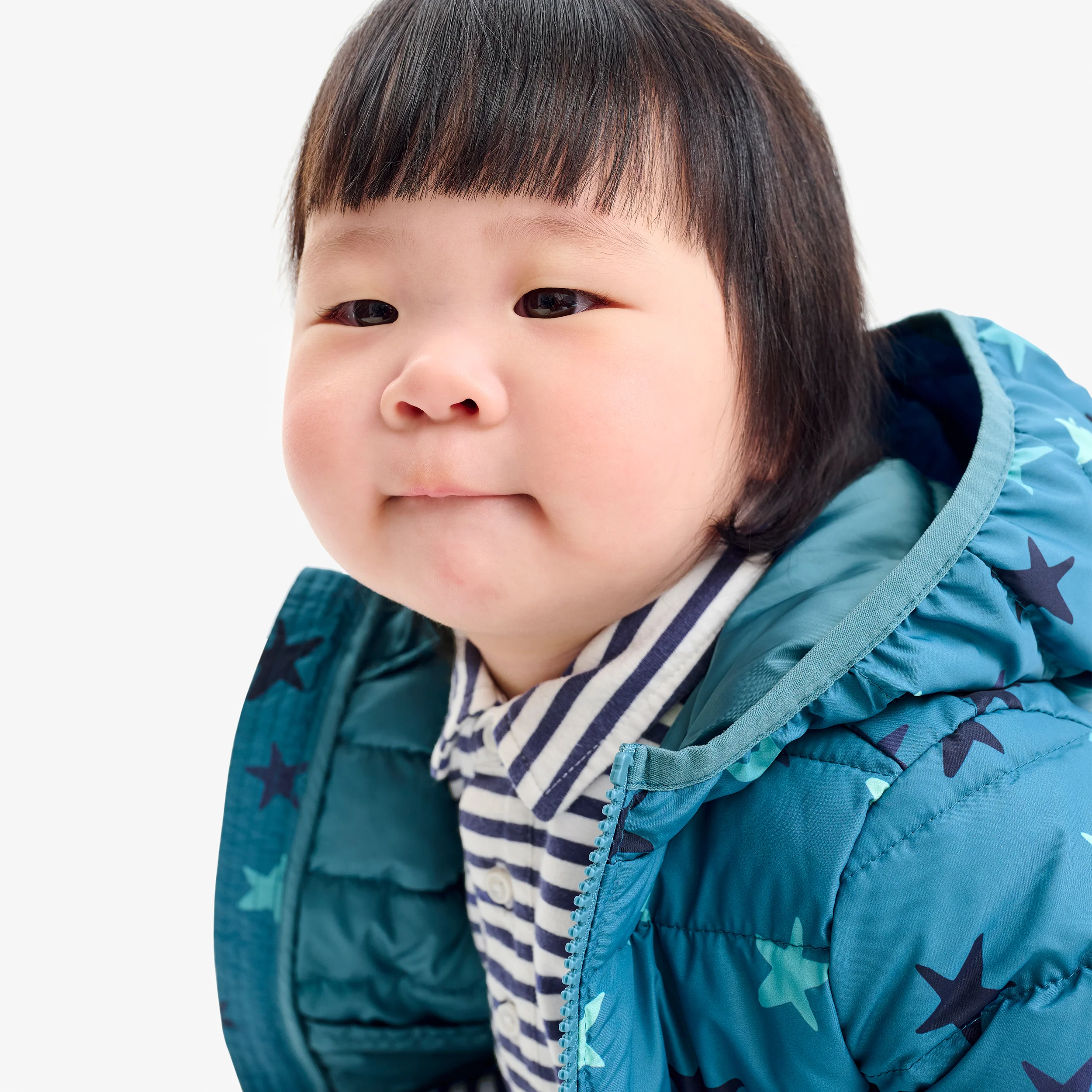20407-baby-lightweight-puffer-jacket-in-confetti-stars-1.webp